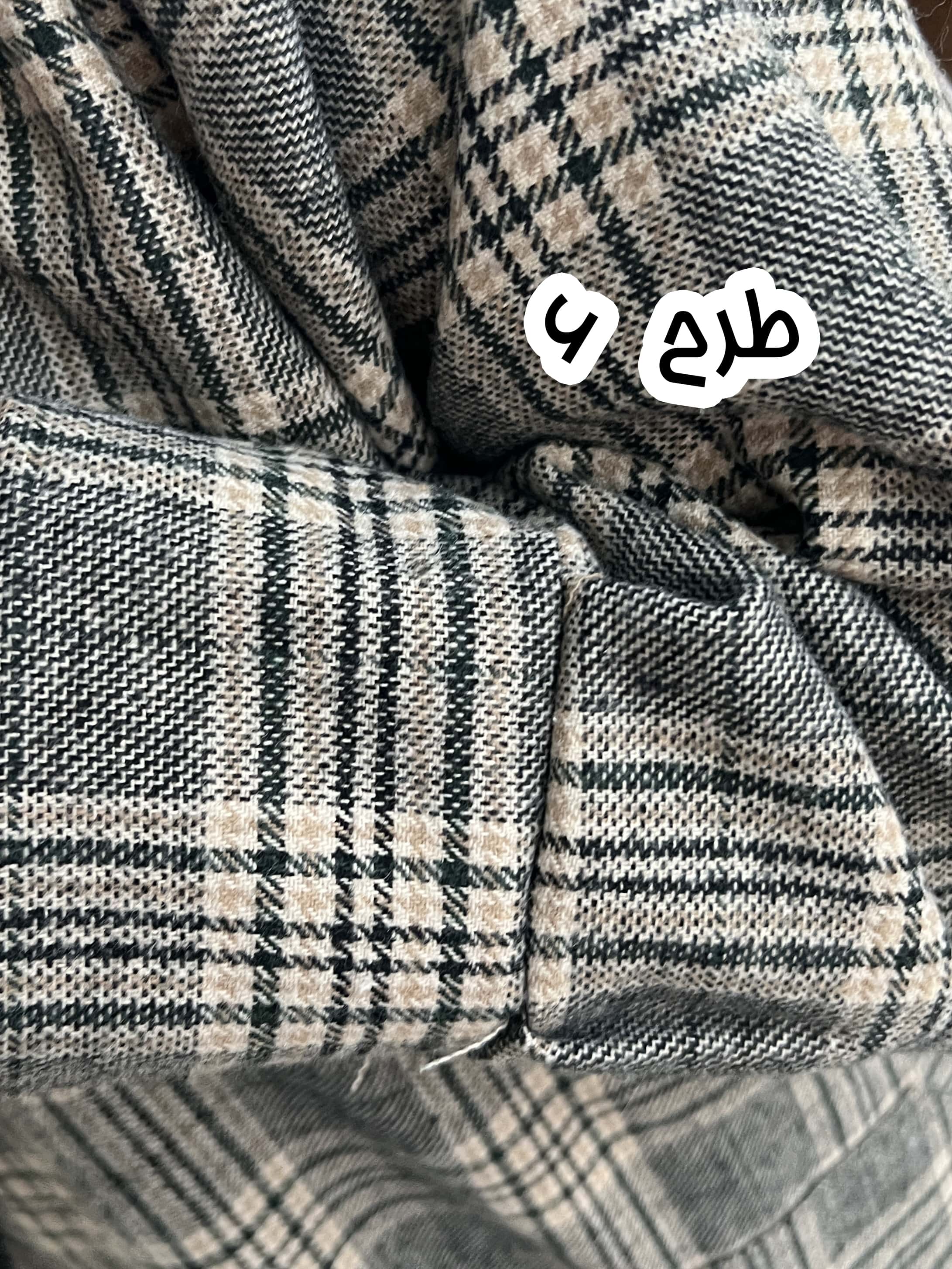 کفتان پشمی بلند باران